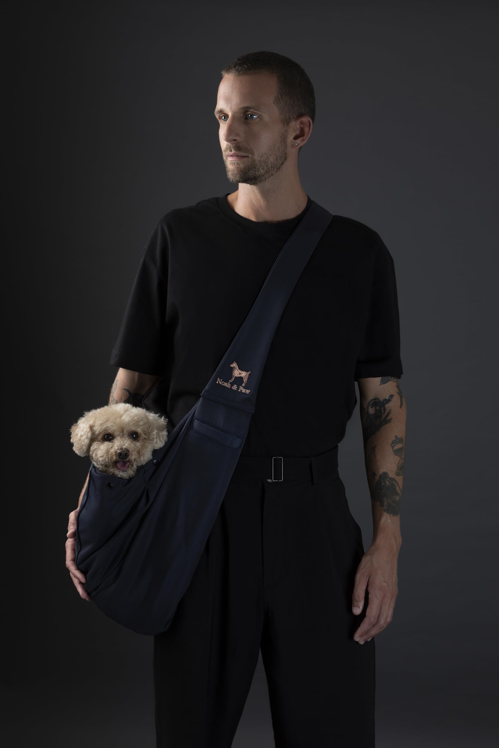 Noah & Paw dog sling with adjustable strap enables quick length changes for comfortable carrying.
