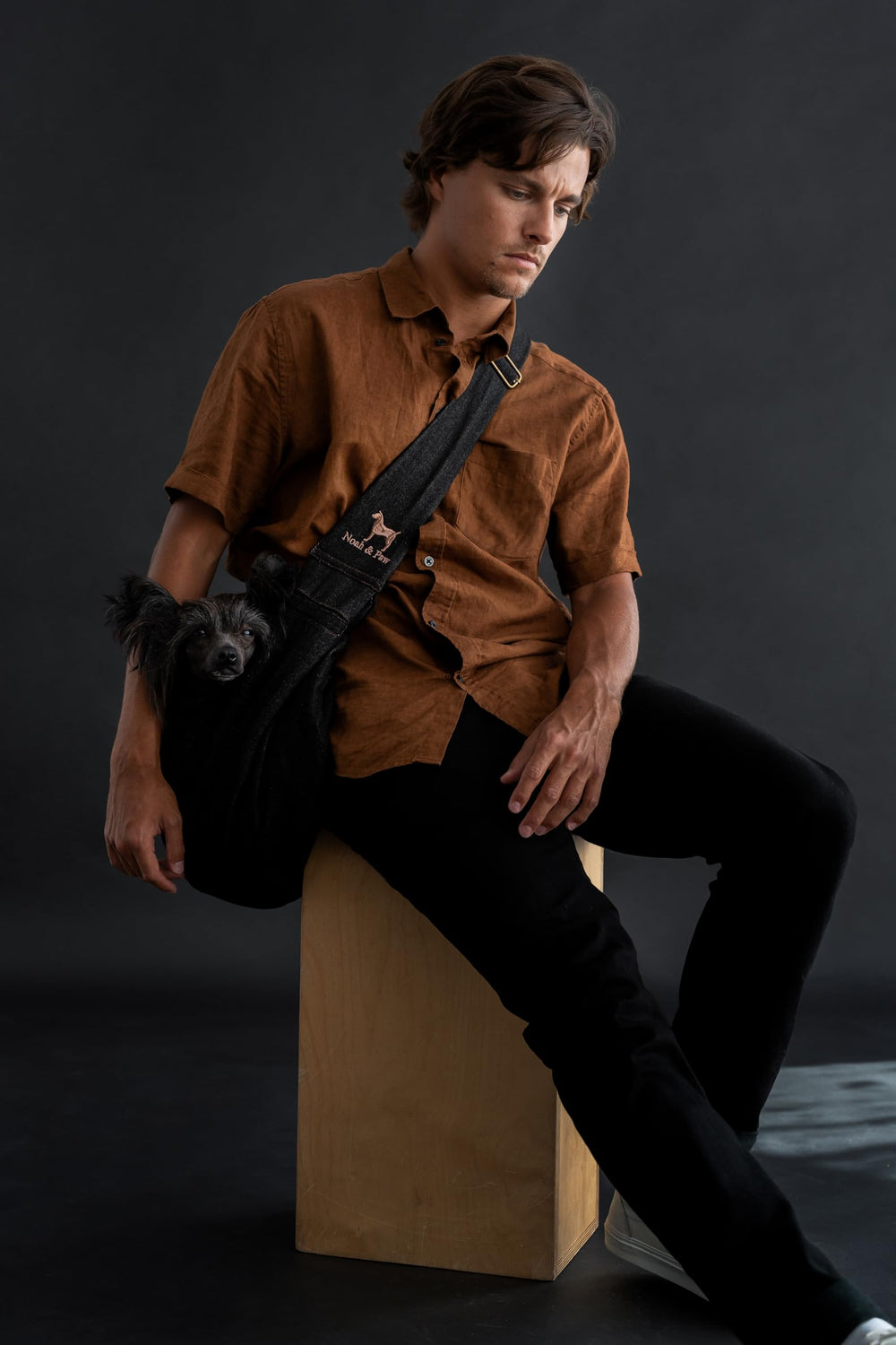 NOAH & PAW sling features adjustable strap for a customizable fit