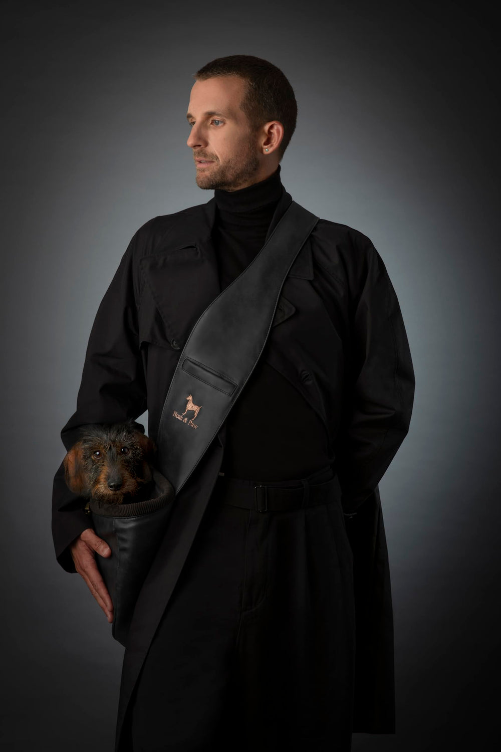 NOAH & PAW dog sling carrier front zip closure demonstrates secure triple-layer safety