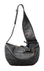 NOAH & PAW dog sling carrier side view shows compact small-dog fit for everyday errands