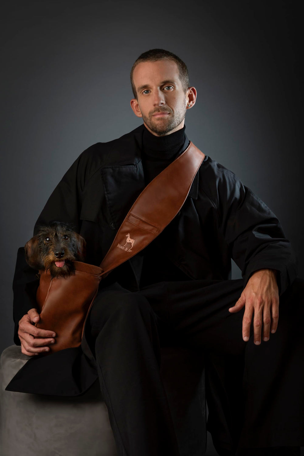 Noah & Paw cat-friendly sling in-use demonstrates versatile small-animal carrier.