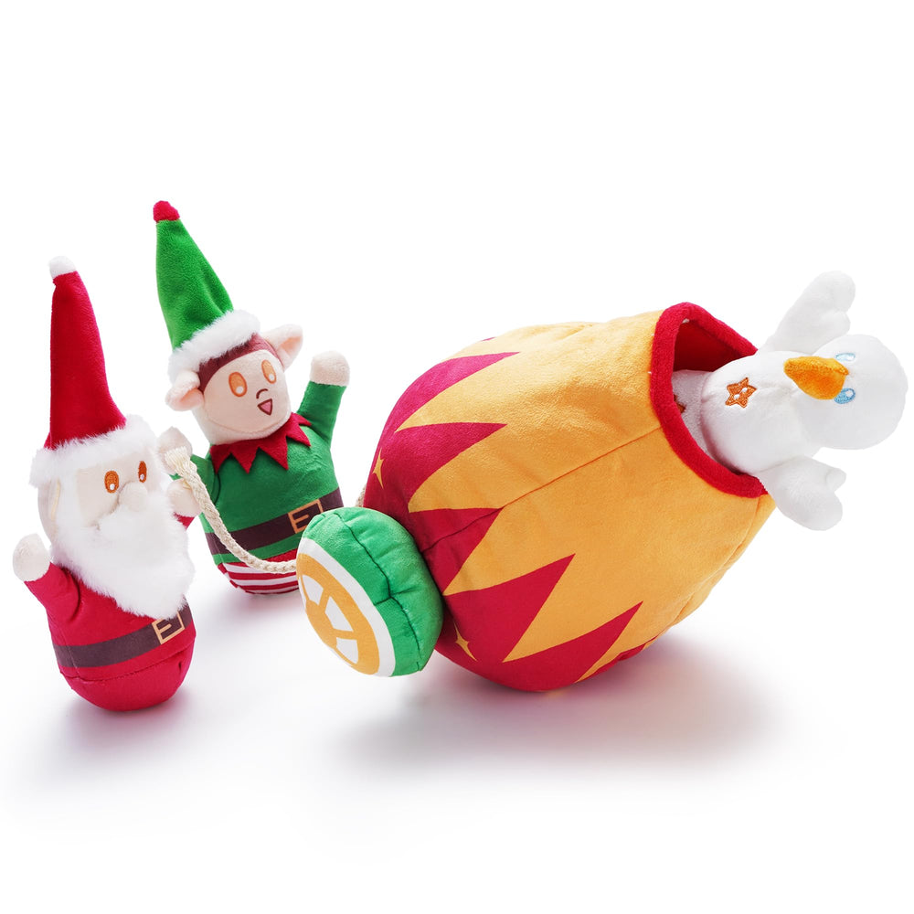 Nocciola Christmas Santa plush inside cannon bag for interactive hide-and-seek play.