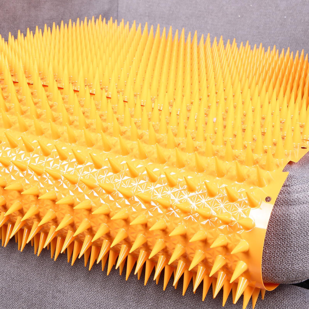 Bright orange Nuanchu cat mat enhances visibility and deterrence.