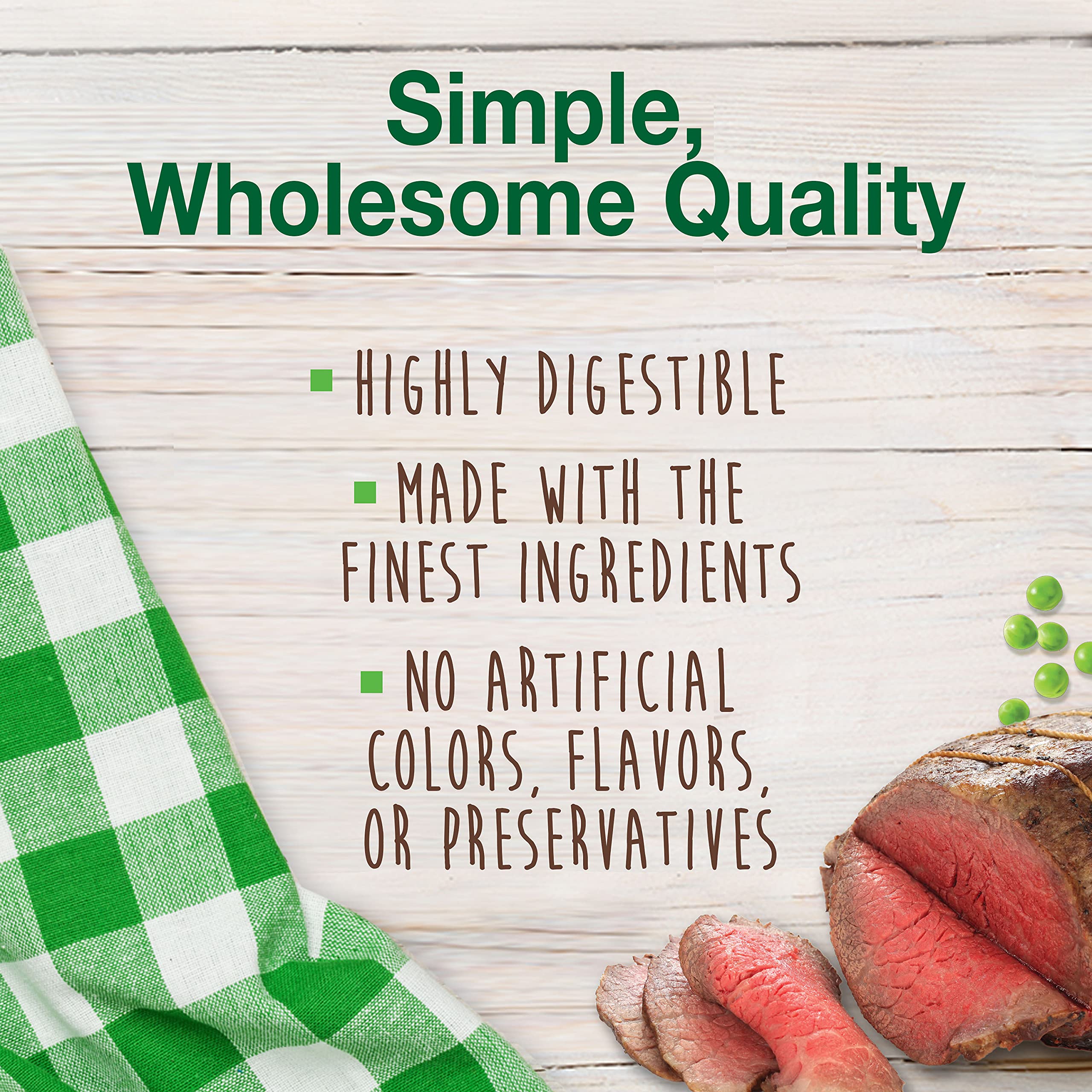 Dog chewing Nylabone Healthy Edibles roast beef chew in home setting.