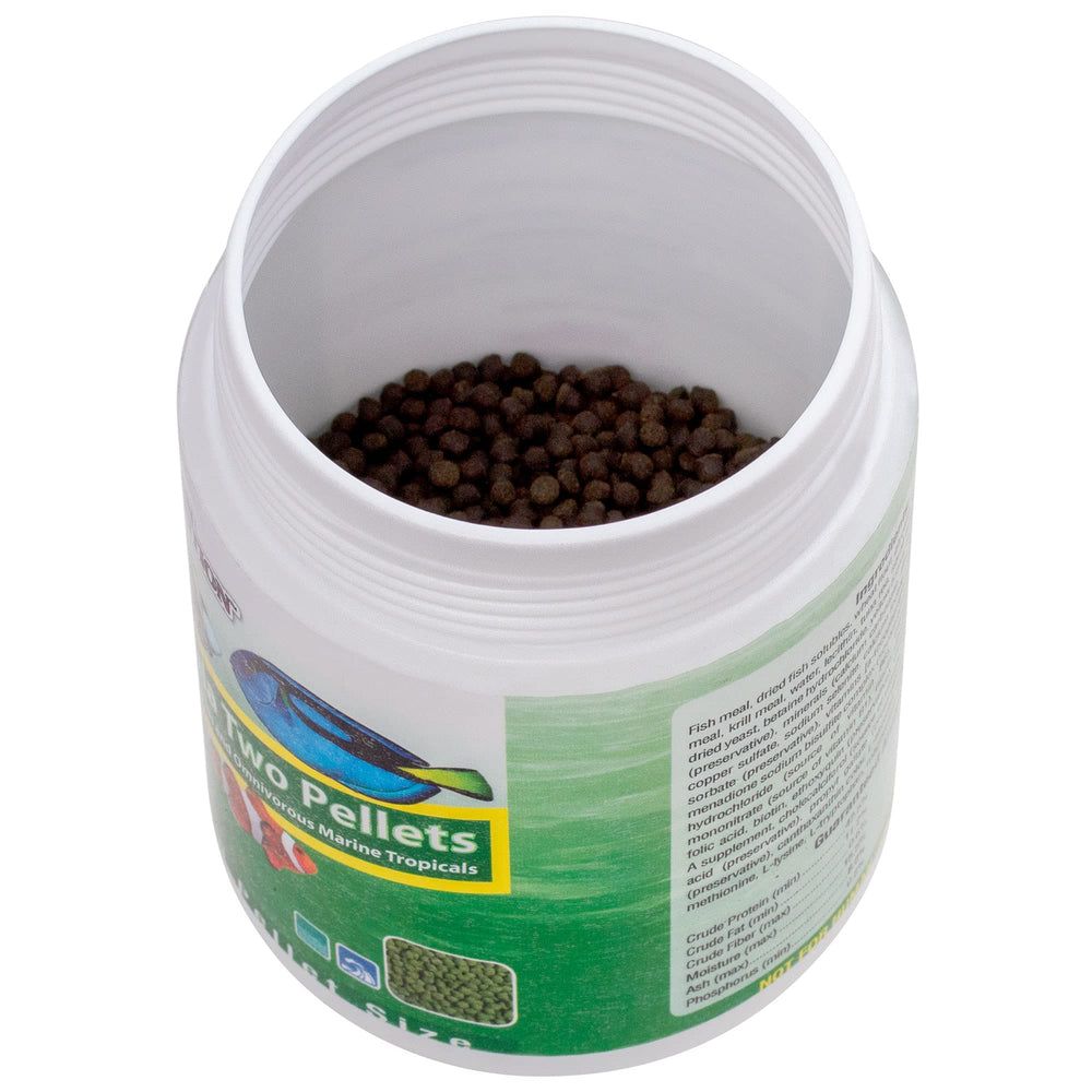 Ocean Nutrition Formula Two in clear aquarium water shows non-clouding formula.
