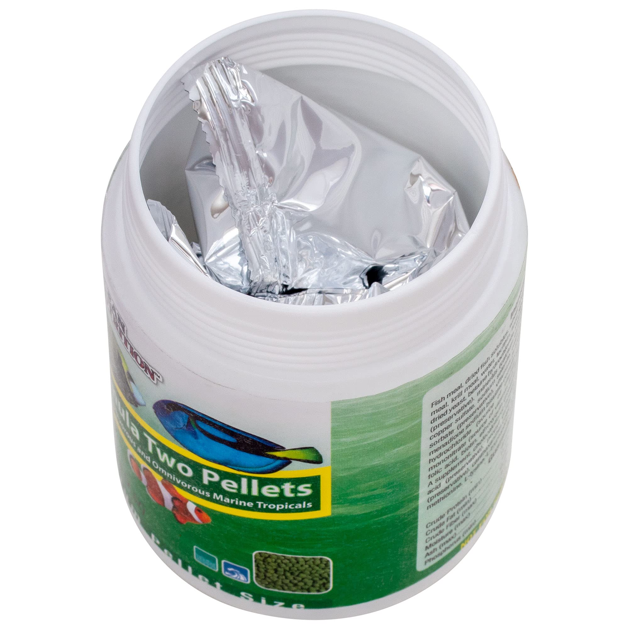 Ocean Nutrition Formula Two pellets being dispensed into tank for simple feeding.