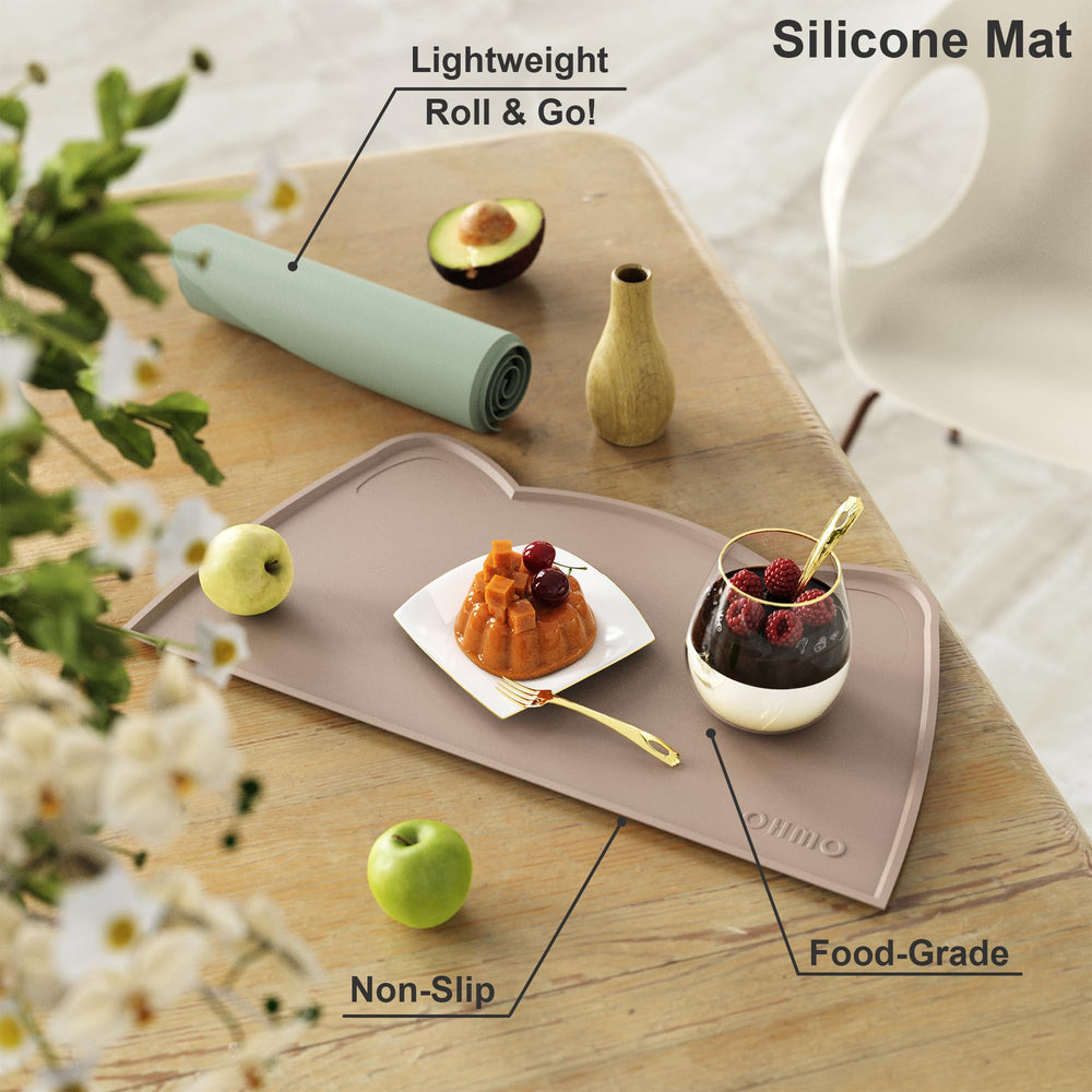 OHMO Cat Food Mat rolled for storage shows portability for travel.