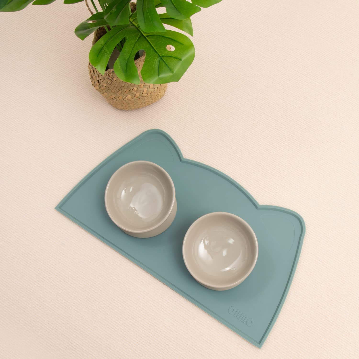 OHMO cat food mat folds for travel and storage when empty.