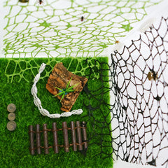 Oialonne jumping spider climbing web 1 offers natural climbing for enrichment.