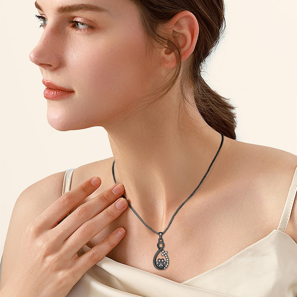 Oinsi Infinity Love pendant with secure screw-top opening for keepsakes.