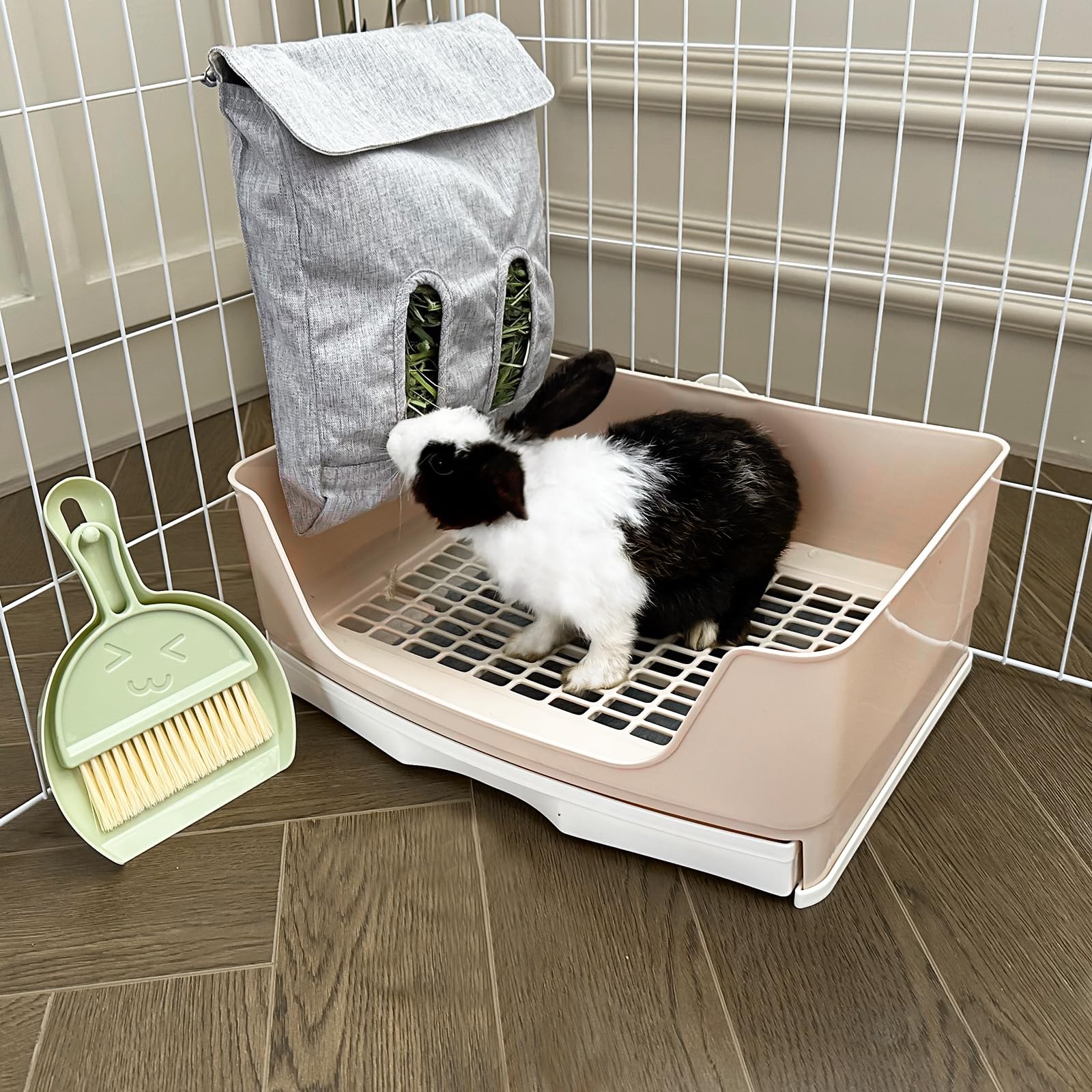 Oleisert rabbit litter box drawer open for quick waste disposal.