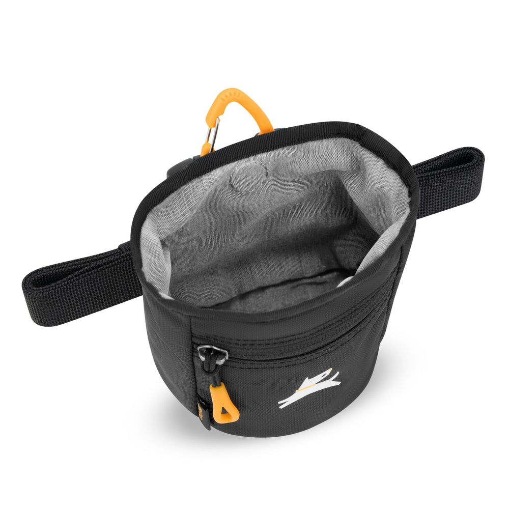 OllyDog Goodie Treat Bag clipped to a belt loop for hands-free use