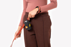 OllyDog Scoop Pick Up close-up showing secure zipper for quick bag access