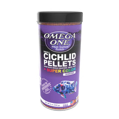 Omega One sinking cichlid pellets pouring from bottle for easy feeding.