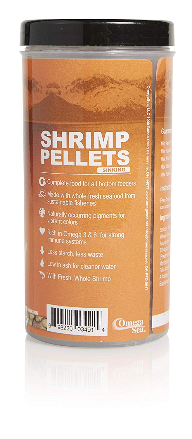 Omega One sinking shrimp pellets feeding scene highlights cleaner tank with insoluble formula.