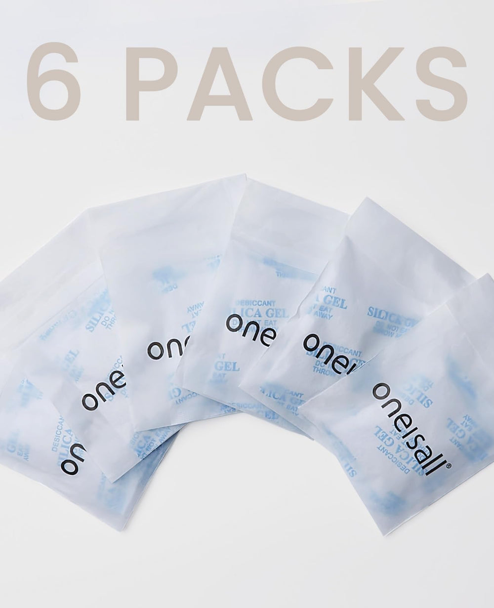 oneisall desiccant bag six-pack beside an automatic cat feeder for dryness.