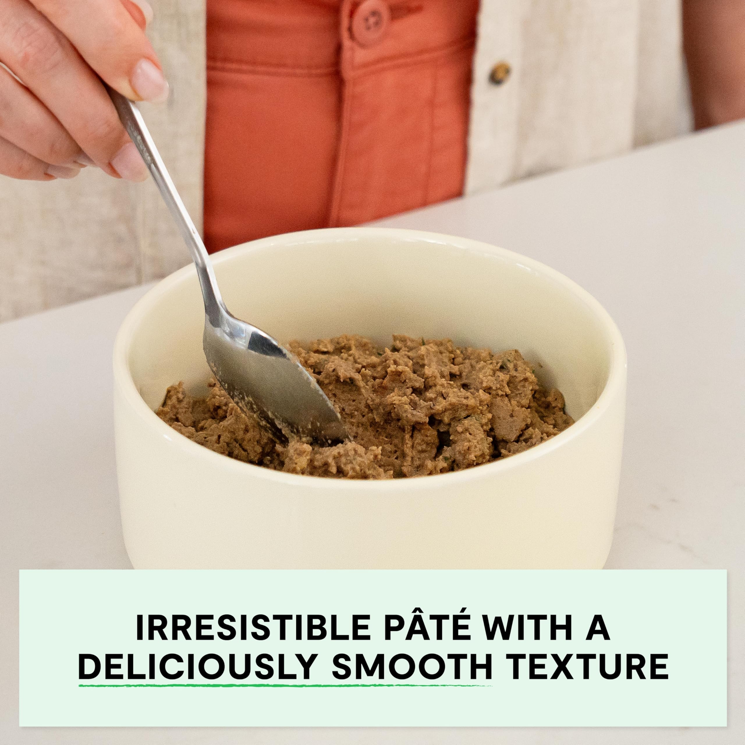 Open Farm dog food pate vegetable blend in a bowl with sweet potatoes and spinach