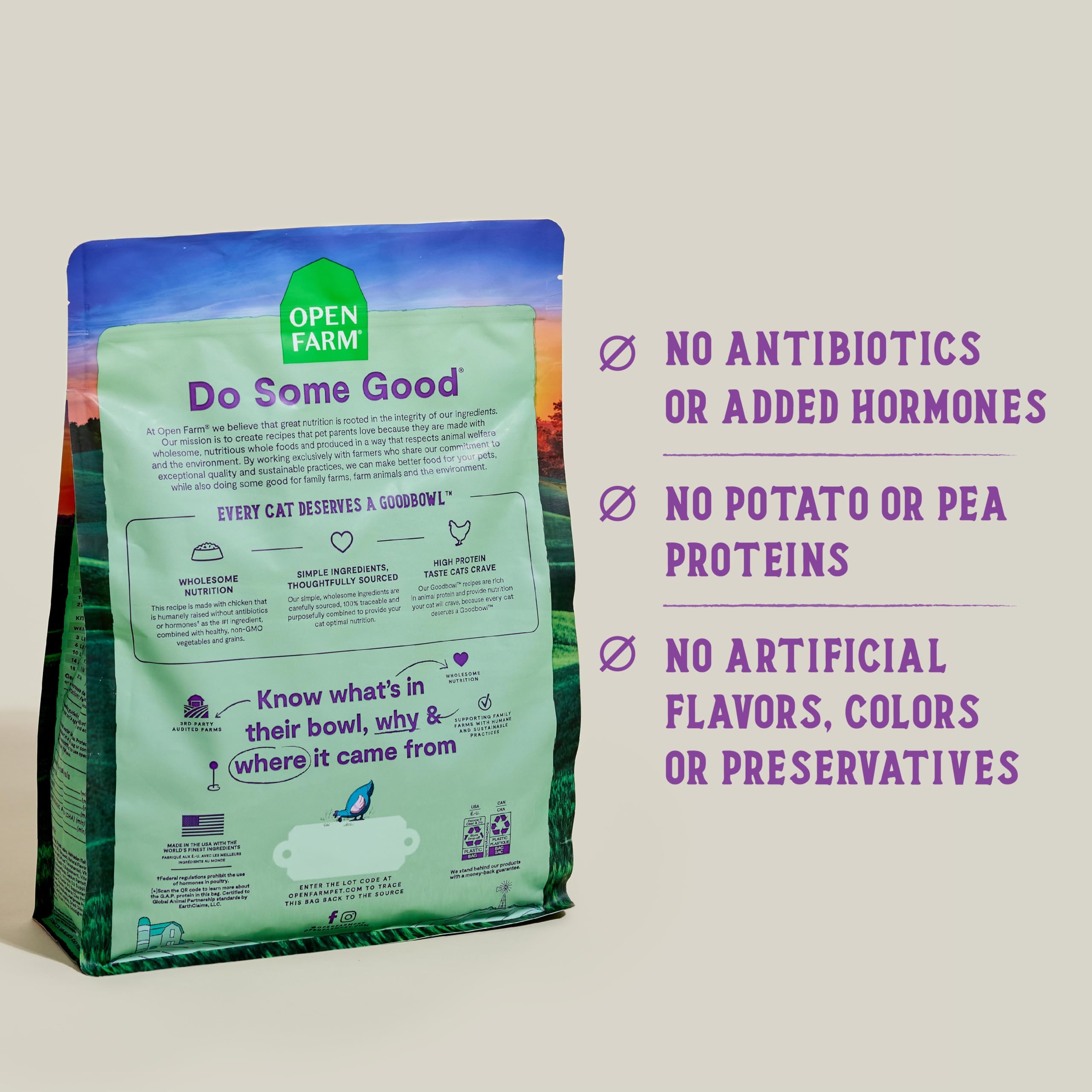 Open Farm Goodbowl chicken brown rice kibble on scoop for balanced nutrition.