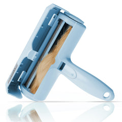 ORDORA pet hair remover in use on a couch to reveal a fur-free surface.