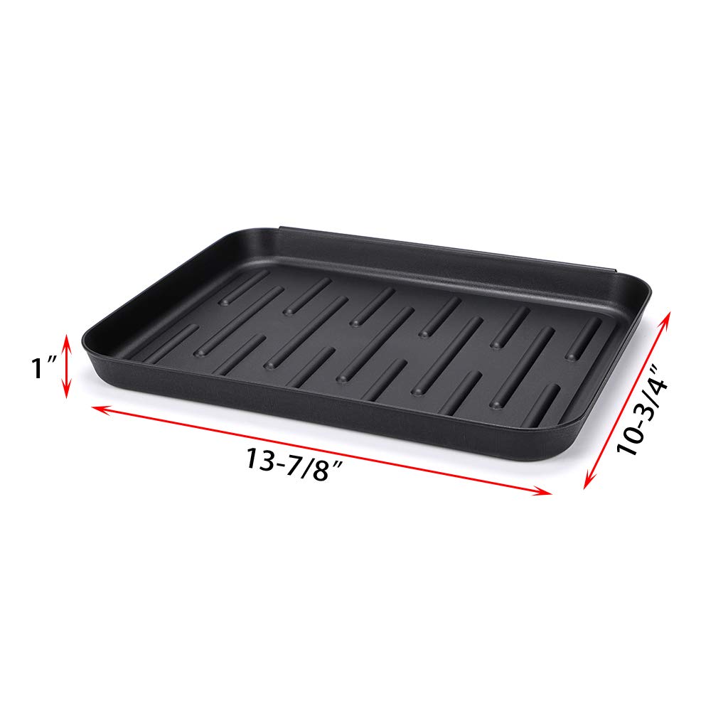 OwnMy boot tray mat indoors catches spills while drying shoes after wet weather.