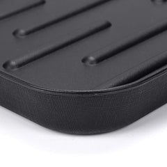 OwnMy boot tray mat under cat litter box contains mess for easier cleaning.