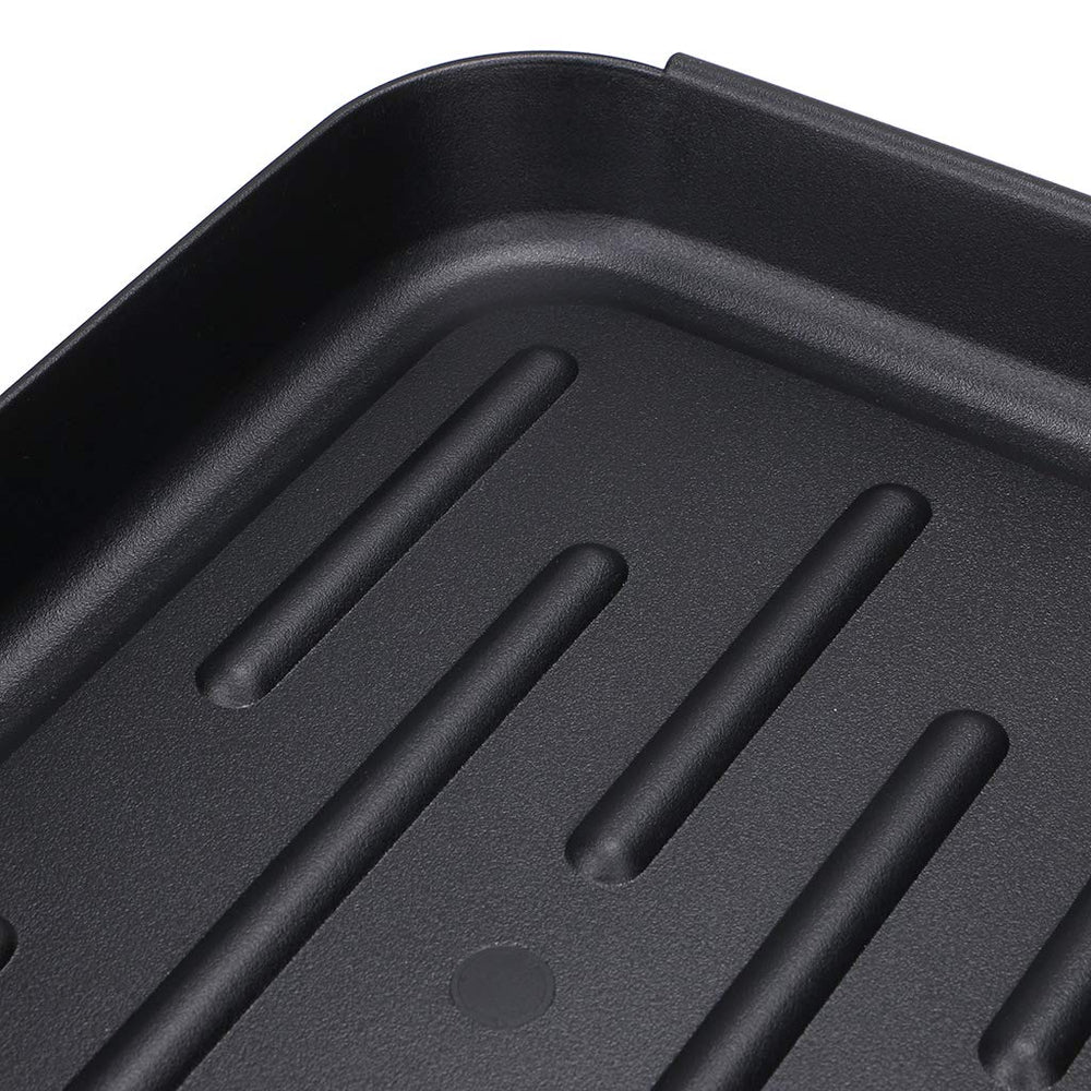 OwnMy boot tray mat under pet bowls prevents drips from reaching floors.