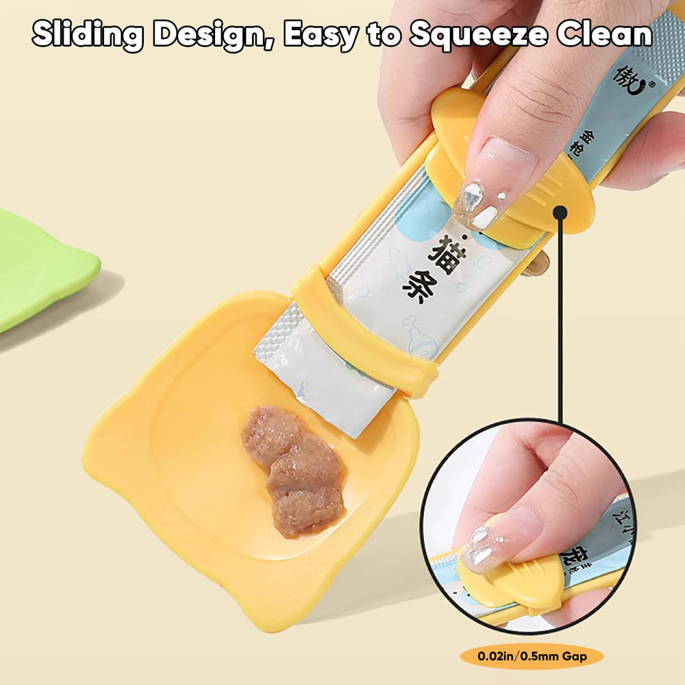 Panup Cat Strip Feeder in yellow, dispensing action demonstrates sliding strips into spoon.