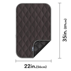 Paw Inspired crate mat gray in kennel illustrates secure fit and easy cleaning