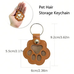 Paw-shaped leather pet fur keychain capsule securely holds fur in a keepsake