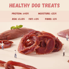 Happy small-to-medium dog taking a Pawmate treat during training rewards focus and positive reinforcement