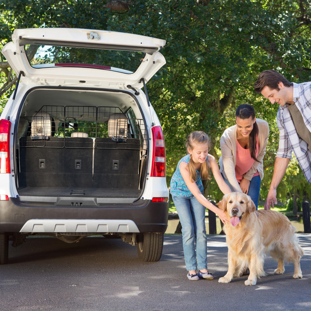 Pawple Dog Car Barrier shown in use between cargo and passenger area.