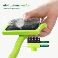 Pecute slicker brush air-cushion close-up highlighting gentle undercoat lift.