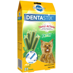 Pedigree Dentastix Mini treat held in hand for size comparison.