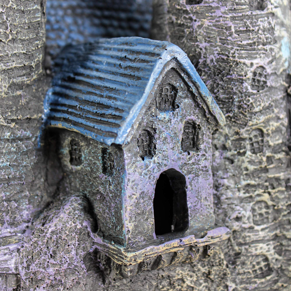 Penn-Plax Age-of-Magic Wizard’s Castle Part B tower detail showcases archways and vibrant roofs.
