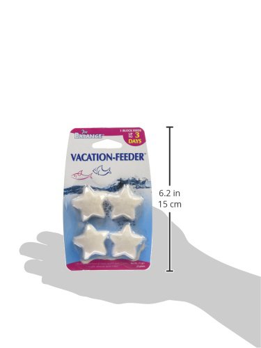 Penn-Plax Pro Balance Vacation Fish Feeder starfish-block dissolving in water to feed during your absence.