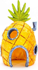Penn-Plax SpongeBob Pineapple House close-up highlights resin texture and bright yellow-orange tones.