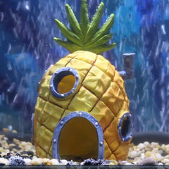 Penn-Plax SpongeBob Pineapple House side view showcases vibrant character in your aquarium.