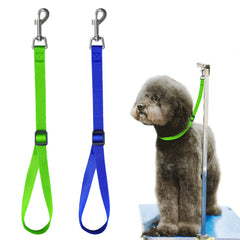 Periflowin grooming loops adjusted on a dog for secure, hands-free grooming.