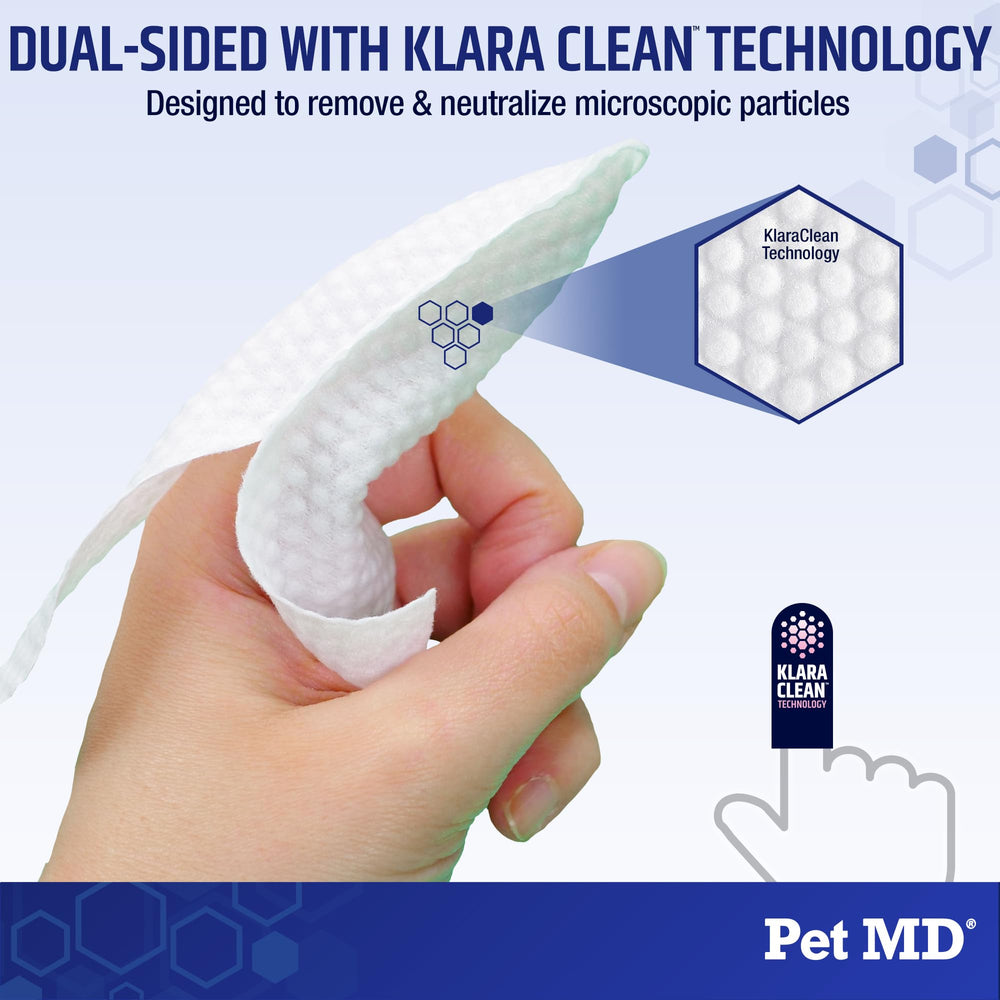 Pet MD Finger Wipes used on a dog's eye area for debris removal.