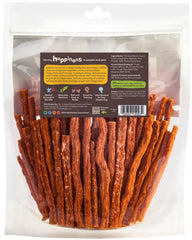 Pet 'n Shape Chik 'n Sweet Potato Stix treat piece showing chewy texture for training.