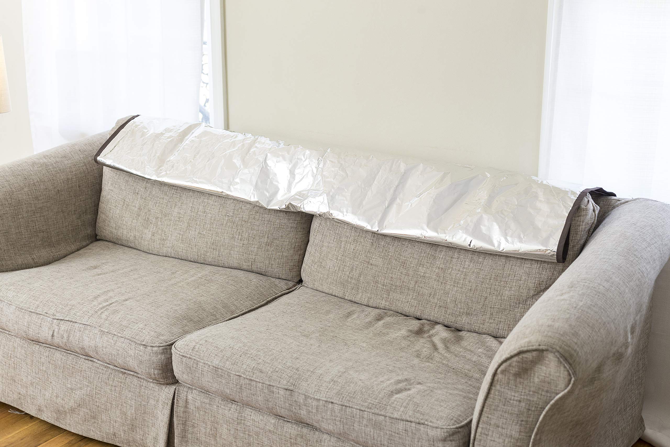 Pet Parents Pain-Free Pet Repeller Mat edge coverage on furniture.
