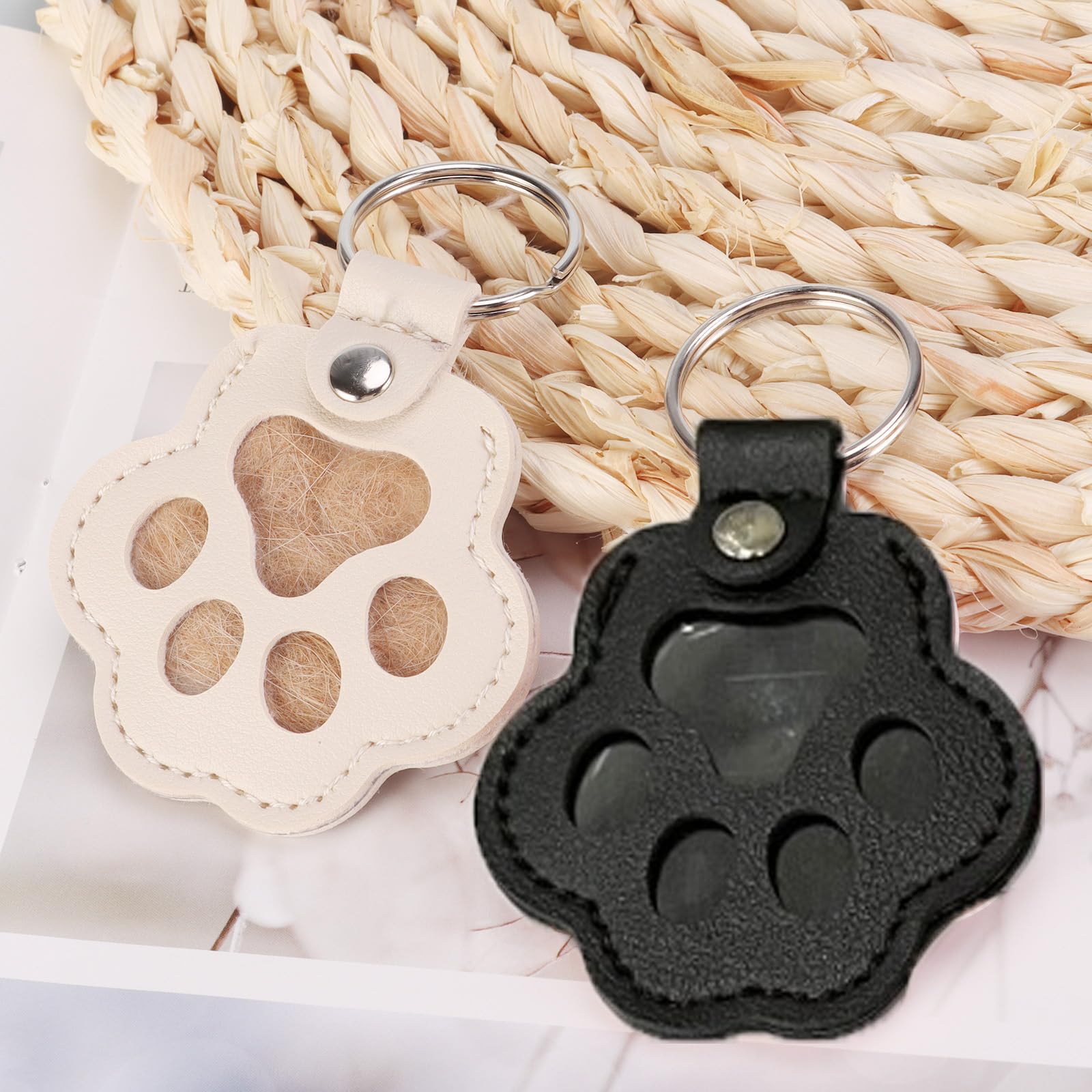 Pet paw leather keychain design featuring durable charm for daily use.