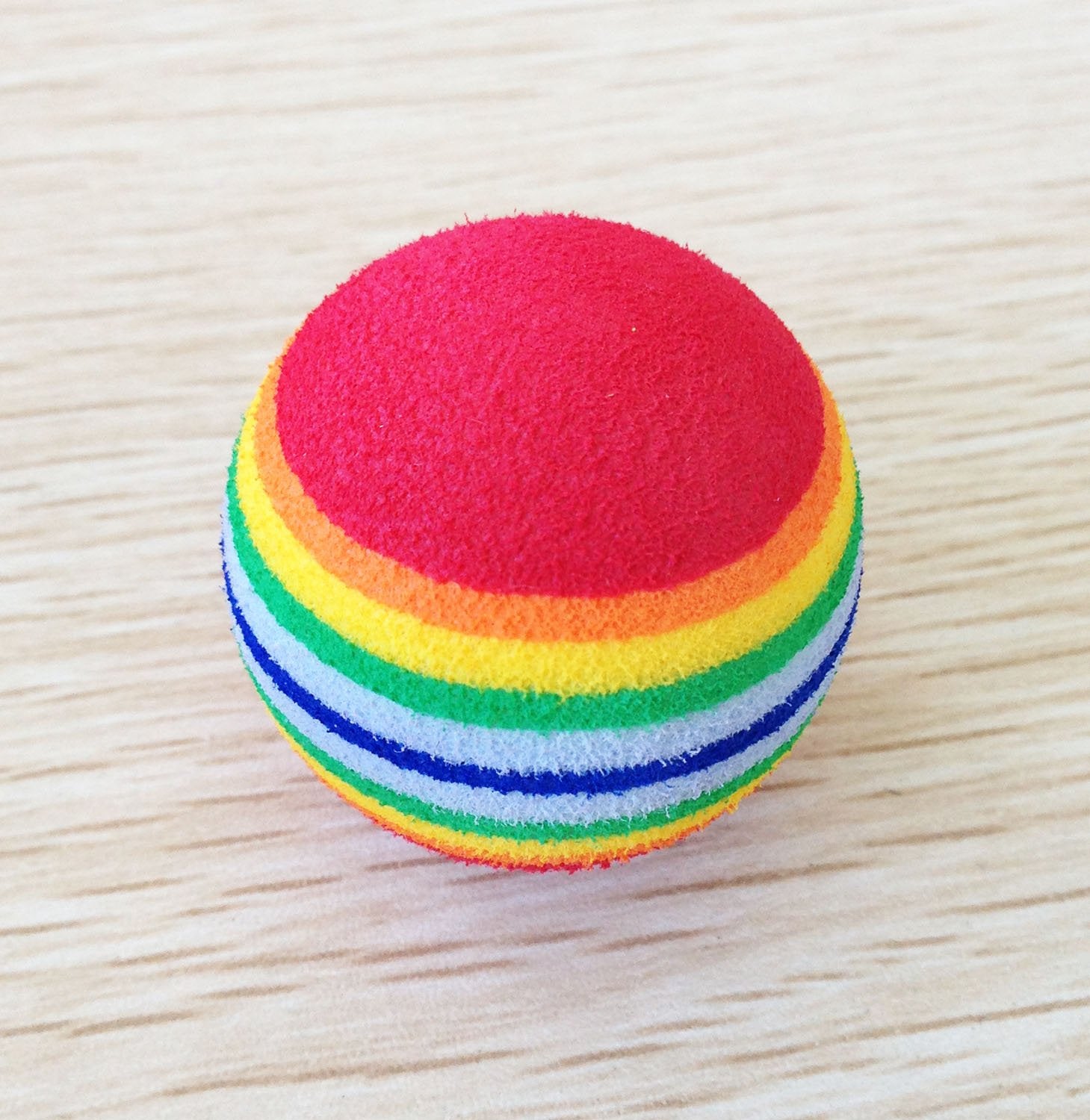 PET SHOW foam ball red rainbow, easy roll for independent or social play.
