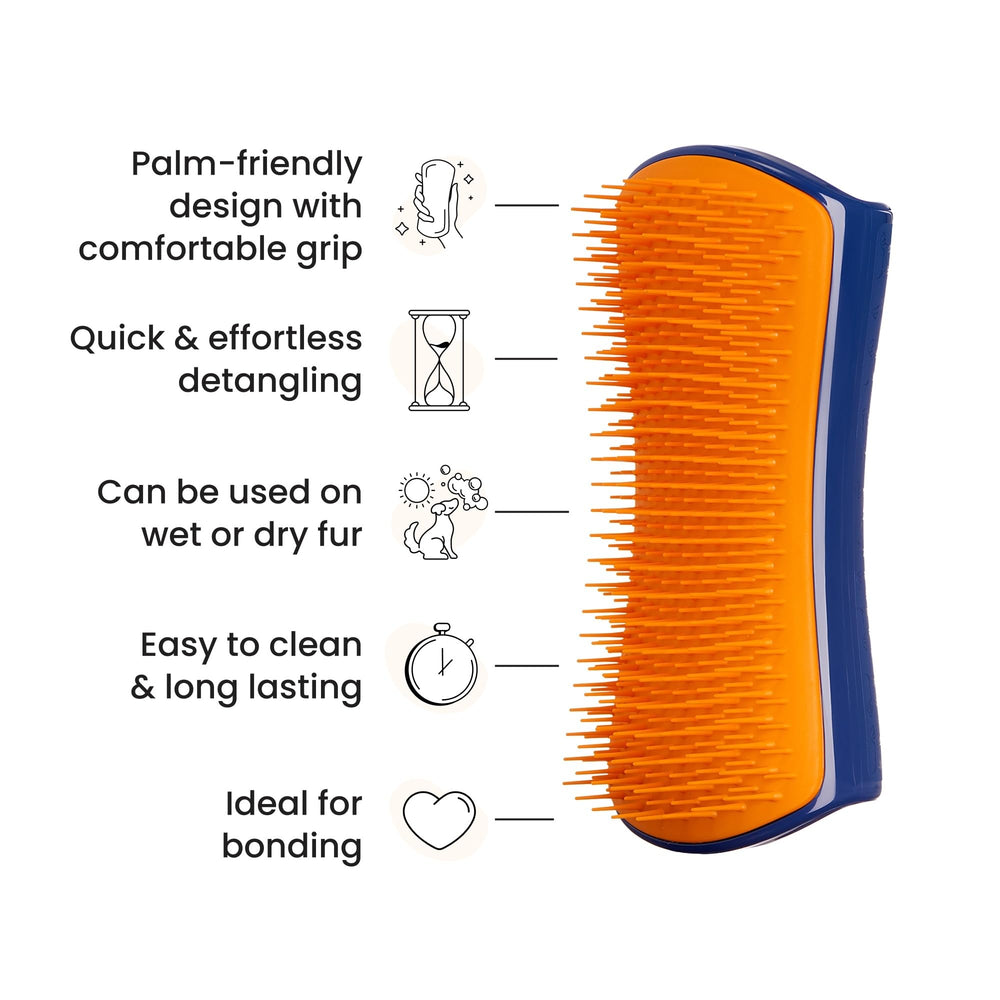 Pet Teezer diseño ergonómico para la mano, ideal para sesiones largas.