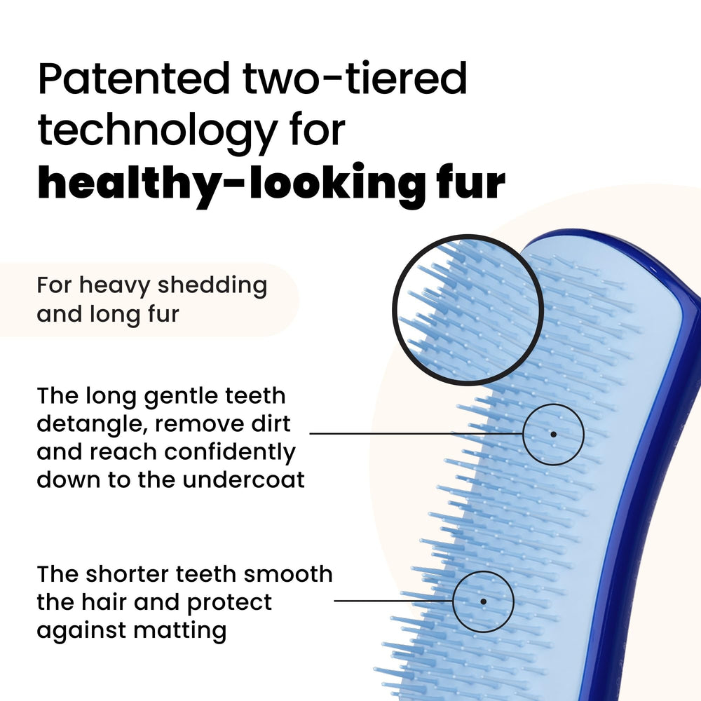 Pet Teezer deshedding dog brush undercoat removal demonstrates effective fur thinning before styling