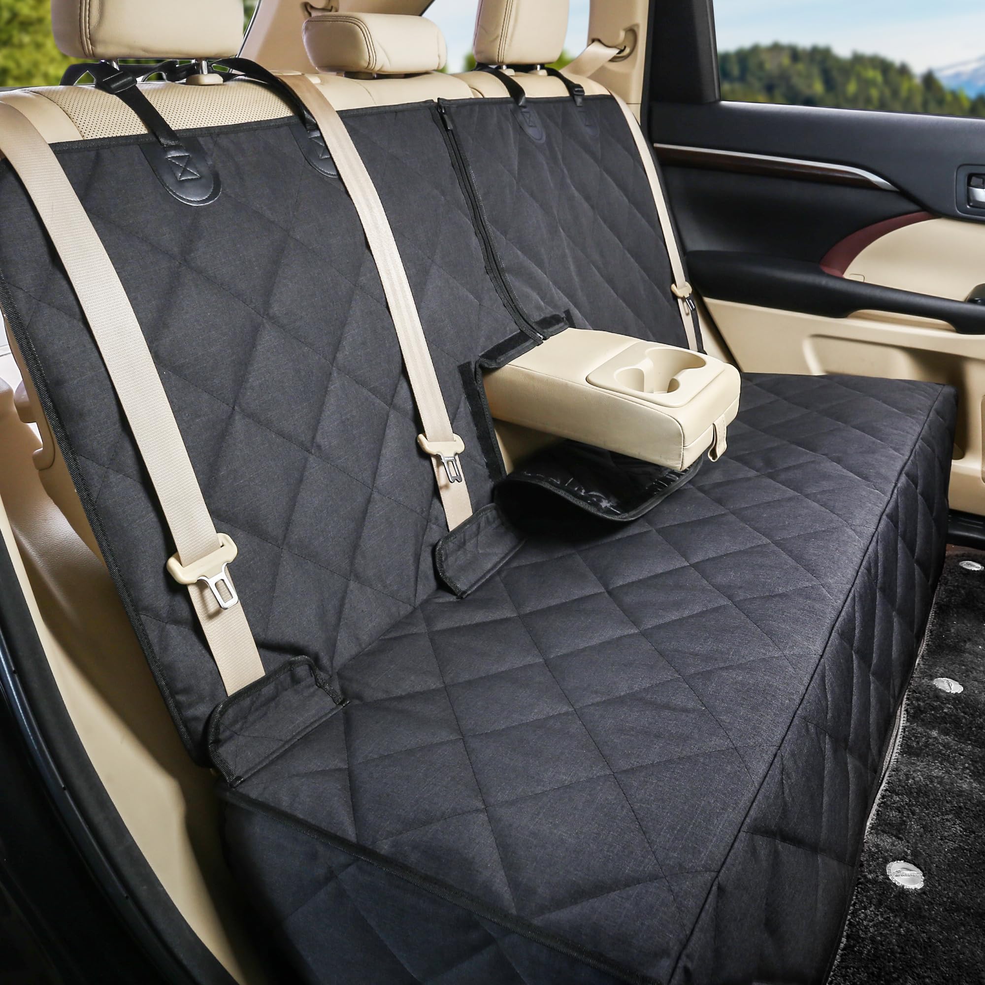 petalage Bench Dog Seat Cover installed in car provides full back-seat protection against mud and fur.