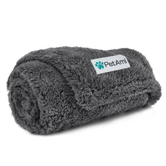 PetAmi fluffy waterproof blanket on a sofa protects furniture from spills and pet messes.