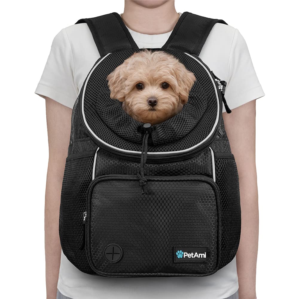 PetAmi front carrier with dispenser pocket and side pockets for essentials on outdoor trips.