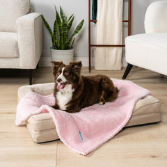 PetAmi pink pet blanket in car seat conveys travel comfort for pets.