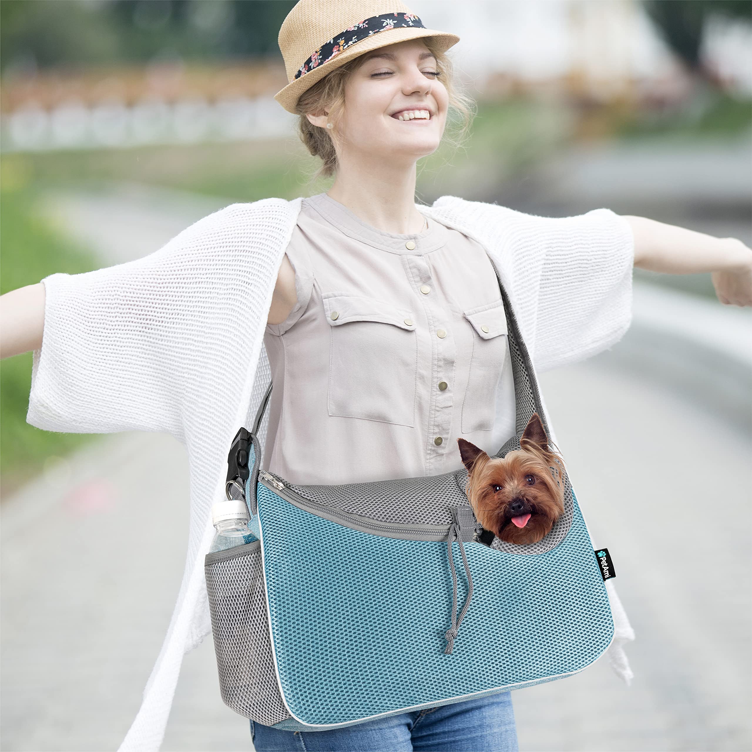 PetAmi safety features with harness strap and reflective trim for added security.